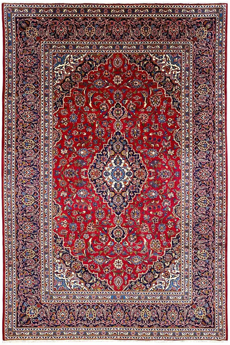 A beautiful Keshan rug in red color representing a medallion in the center along with floral strings. 