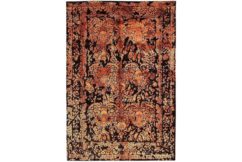 A beautiful designer rug in a Brown and Red color. It has an abstract pattern.